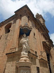 Statue at the southeast corner of the Carmelite Cathedral at Mdina