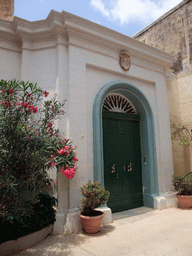 Green door at a house near St. Paul`s Cathedral at Mdina