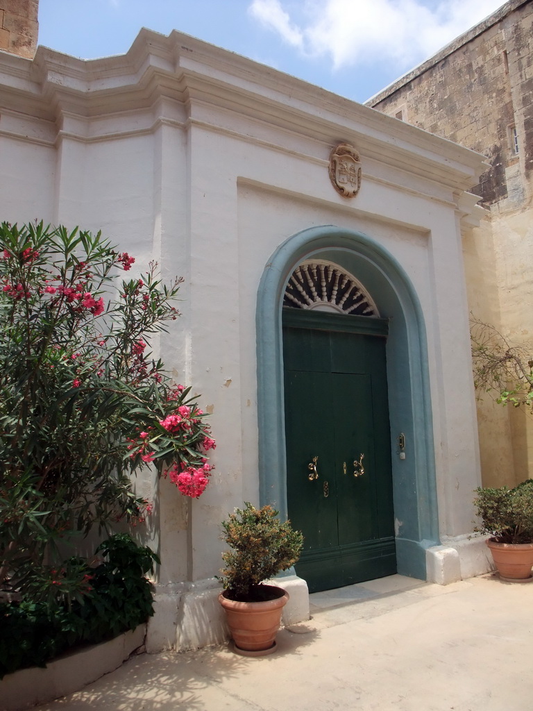 Green door at a house near St. Paul`s Cathedral at Mdina