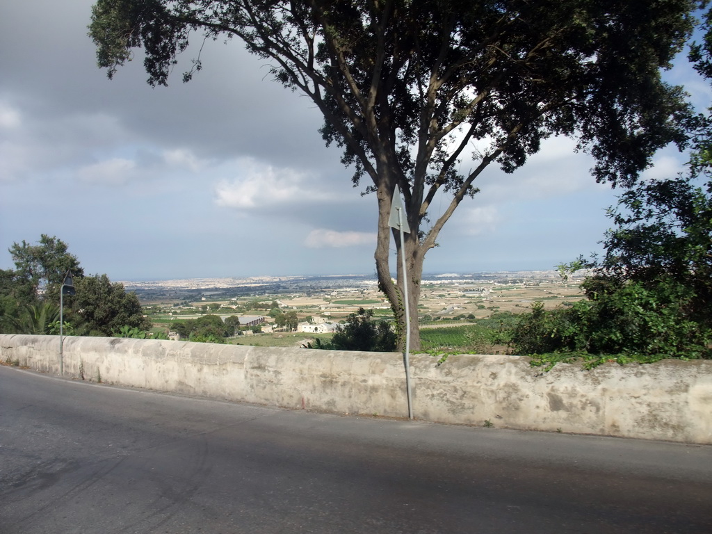 The Triq Nikol Saura street and countryside at the east side of Rabat, viewed from a horse and carriage