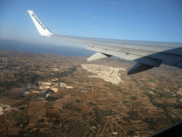 The town of Siggiewi and the south coastline of Malta, viewed from the airplane from Malta to Eindhoven