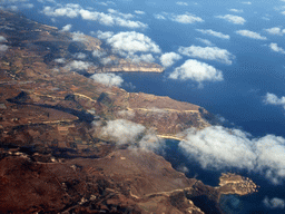Golden Bay, Ghajn Tuffieha Bay and Gnejna Bay at the west coastline of Malta, viewed from the airplane from Malta to Eindhoven