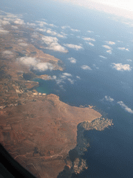 Golden Bay, Ghajn Tuffieha Bay and Gnejna Bay at the west coastline of Malta, viewed from the airplane from Malta to Eindhoven