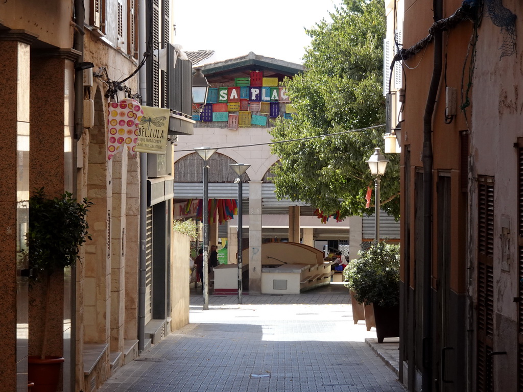 The Plaça de la Constitució square with the Market Hall, viewed from the Plaça de l`Arquitecte Bennàsar square