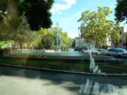 Fountain at the Plaça de Ramon Llull square, viewed from the rental car