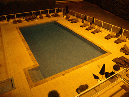 Swimming pool at the Best Western Marseille Aéroport Hotel, viewed from our hotel room, by night