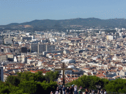 Wooden cross at the square in front of the Notre-Dame de la Garde basilica and the city center, viewed from the road to the Notre-Dame de la Garde basilica