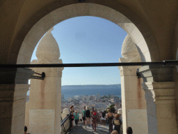 Entrance gate of the Notre-Dame de la Garde basilica and a view on the city center