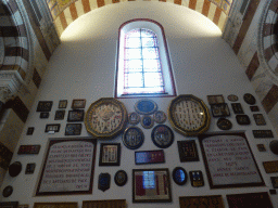 Medals and stained glass window at the first right side chapel of the Notre-Dame de la Garde basilica