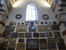 Paintings and stained glass window at the second right side chapel of the Notre-Dame de la Garde basilica