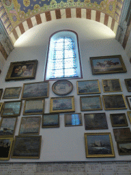 Paintings and stained glass window at the third right side chapel of the Notre-Dame de la Garde basilica