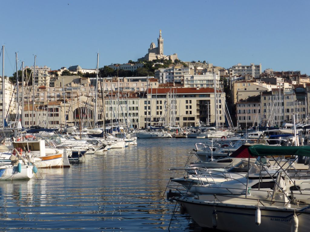 Boats in the Old Port and the Notre-Dame de la Garde basilica