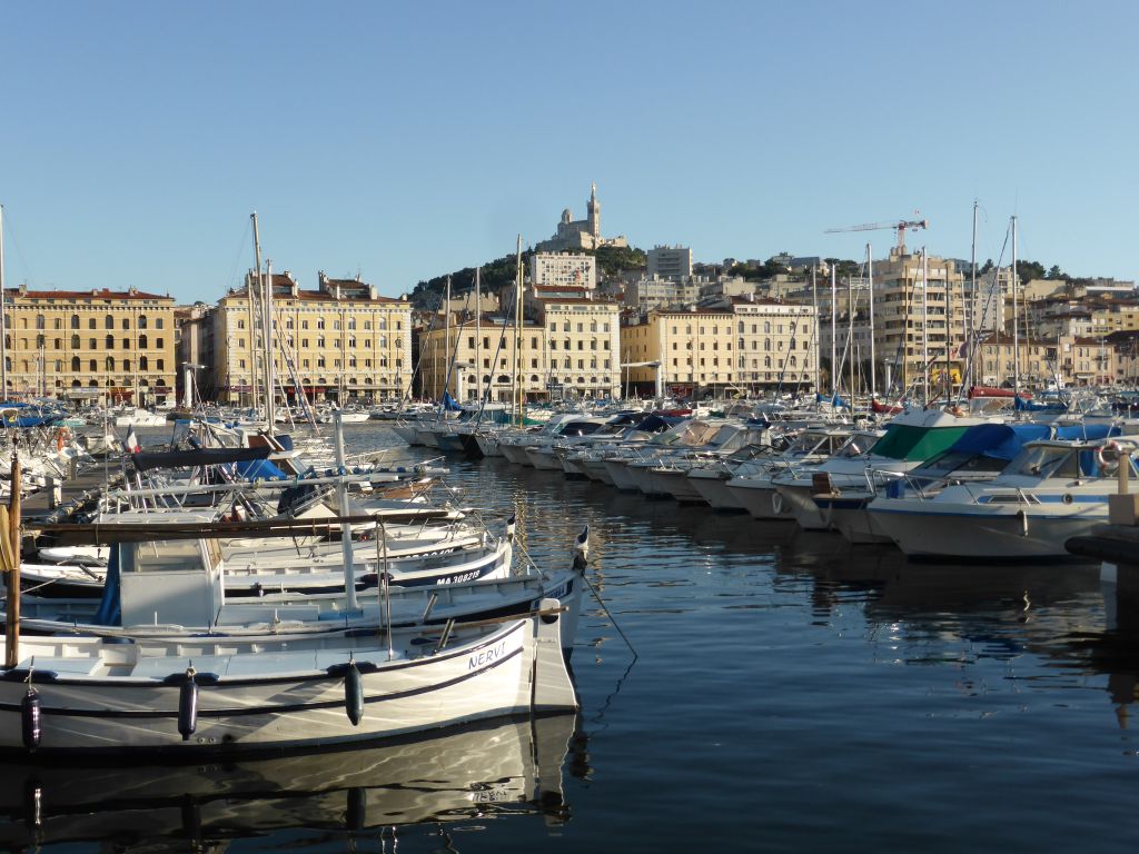 Boats in the Old Port and the Notre-Dame de la Garde basilica