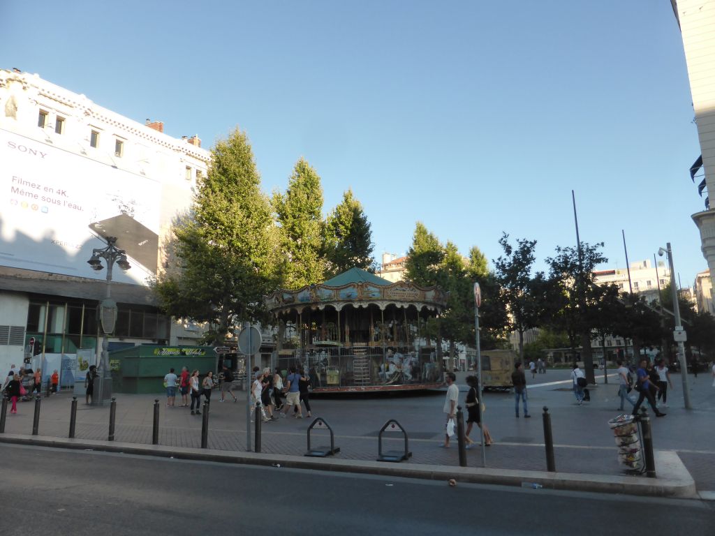 The Place du Général-de-Gaulle square with a carousel, viewed from the La Canebière street