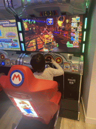 Max playing `Mario Kart` at the gaming room at the Abora Buenaventura by Lopesan hotel
