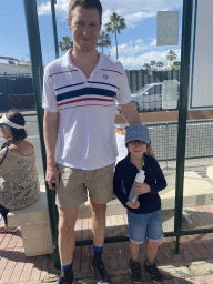 Tim and Max at the bus stop at the Avenida de Gran Canaria street