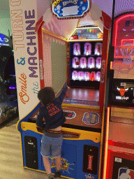 Max playing a ball game at the gaming room at the Abora Buenaventura by Lopesan hotel