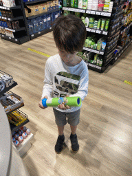 Max with a water gun at the supermarket at the Abora Buenaventura by Lopesan hotel