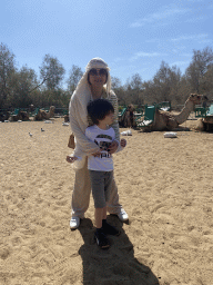 Miaomiao and Max in front of Dromedaries at the starting point of the Camel Safari
