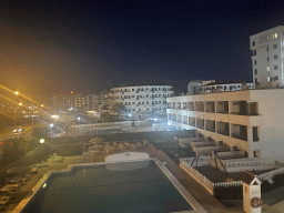 The Green Park Apartments and the Hotel Labranda Playa Bonita, viewed from the pedestrian bridge over the GC-500 road, by night