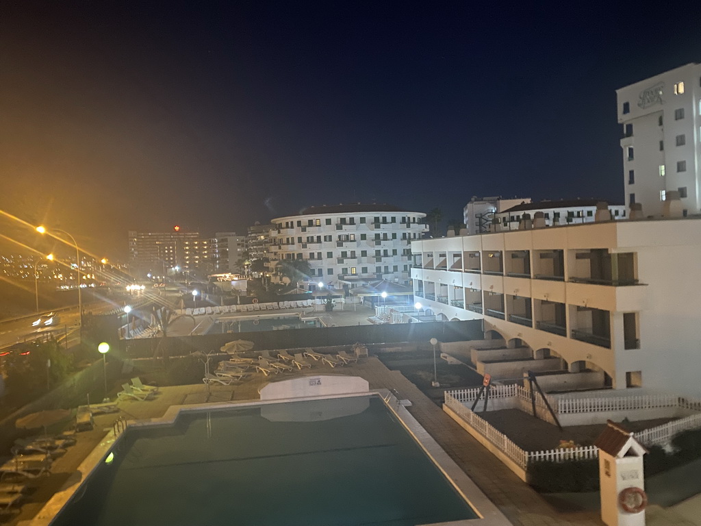 The Green Park Apartments and the Hotel Labranda Playa Bonita, viewed from the pedestrian bridge over the GC-500 road, by night