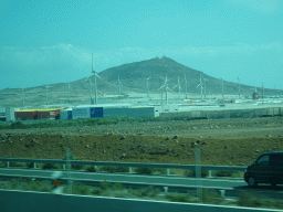 Windmills near the town of Agüimes and the Arinaga Mountain, viewed from the bus to Las Palmas at the GC-1 road