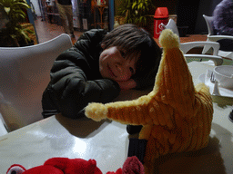 Max with his plush animals at the terrace of the Restaurant Casa Antigua