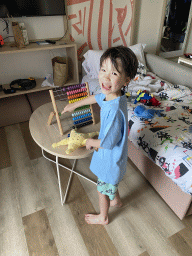 Max playing with the abacus in our living room at the Abora Buenaventura by Lopesan hotel