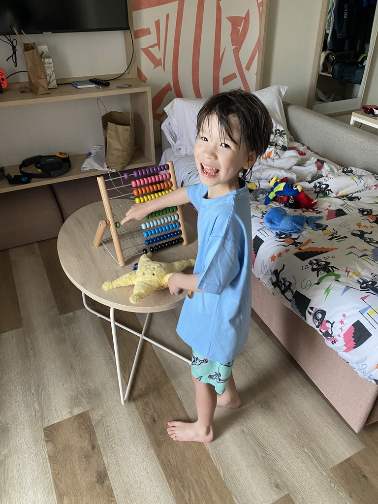 Max playing with the abacus in our living room at the Abora Buenaventura by Lopesan hotel