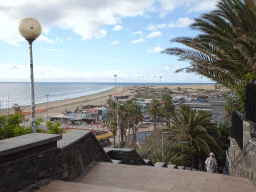 The Playa del Inglés beach and the Maspalomas Dunes, viewed from the staircase from the Paseo Costa Canaria street to the Anexo II shopping mall