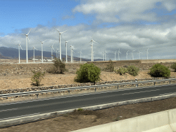 Windmills and the town of Aldea Blanca, viewed from the shuttle bus to the Gran Canaria Airport on the GC-1 road