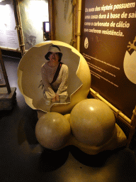 Miaomiao in an egg statue at the Sea Life Porto