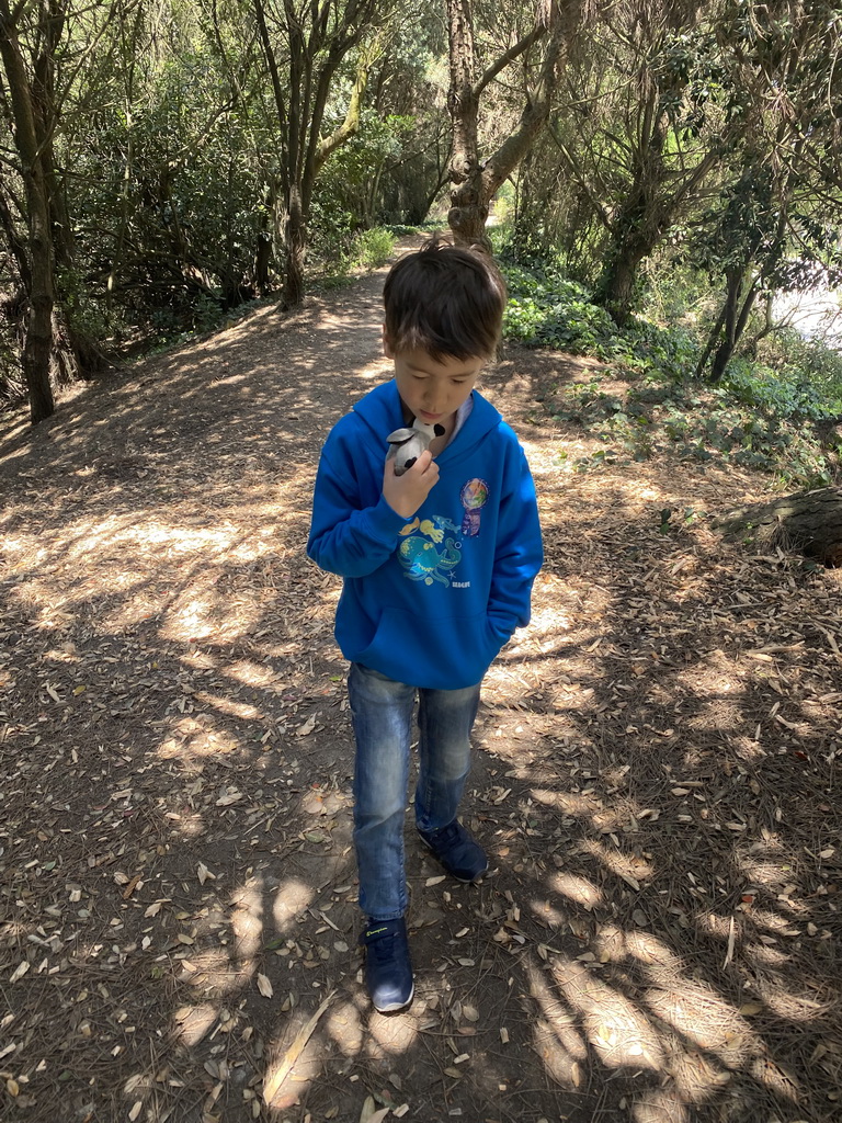 Max with his plush Penguin at the Parque da Cidade do Porto park