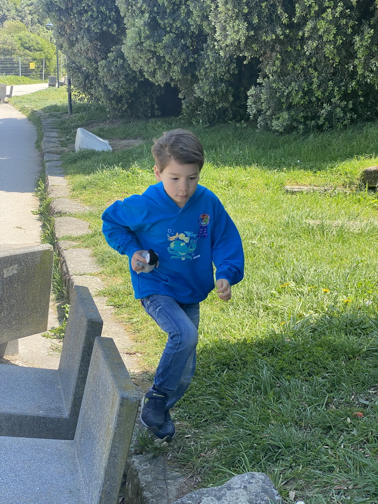 Max with his plush Penguin at the Parque da Cidade do Porto park