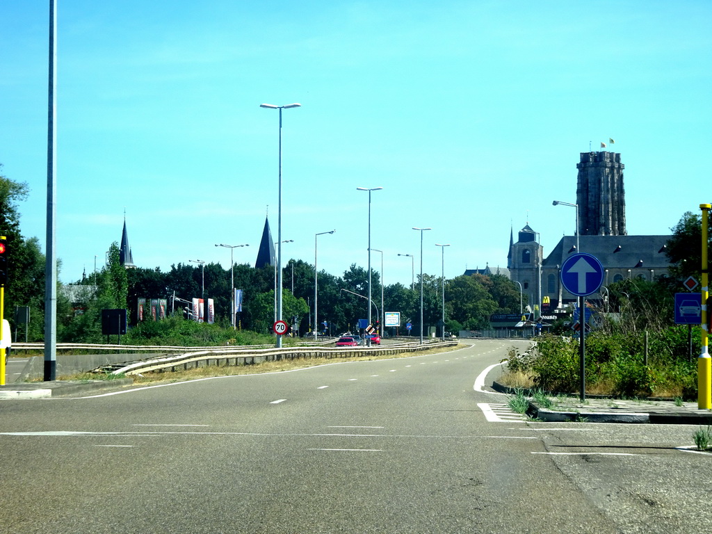 The Begijnhof Church and the towers of the Sint-Katelijnekerk Church, the Sint-Janskerk Church and St. Rumbold`s Cathedral, viewed from the car on the N16 road