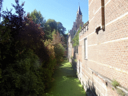 The Groen Waterke canal and the House of Refuge of St. Trond`s Abbey, viewed from the Goswin de Stassartstraat street