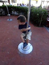 Max on a playground on the Sint-Romboutskerkhof square