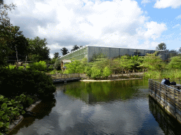 Pond and the `Adembenemend Azië` building at the Asia section of ZOO Planckendael