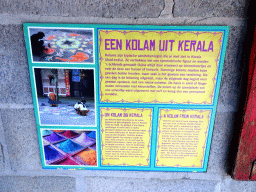 Explanation on the Kolam sand drawing at the Indian village Kerala at the Asia section of ZOO Planckendael