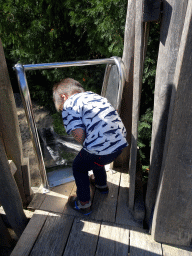 Max at a slide at the grandstand of the birds of prey show at the Europe section of ZOO Planckendael