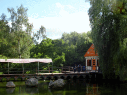 Pond, bridge and buildings at the Oceania section of ZOO Planckendael