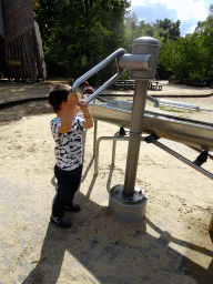 Max playing with water at the playground at the Africa section of ZOO Planckendael