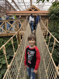 Max on the rope bridge at the `Adembenemend Azië` building at the Asia section of ZOO Planckendael