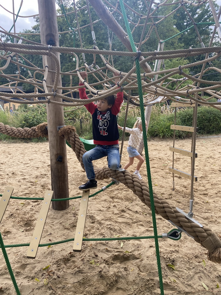 Max on a rope bridge at the playground near Restaurant Toepaja at the Asia section of ZOO Planckendael