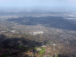 The northeast side of the city, skyscrapers in the city center and the coastline, viewed from the airplane from Sydney