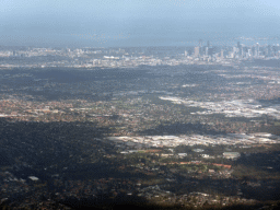 The suburb of Darebin, the AAMI Park stadium, skyscrapers in the city center and the coastline, viewed from the airplane from Sydney