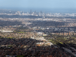 The north side of the city with the Hume Highway, the railway, the Coburg Drive-In Theatre and the Fawkner Cemetery, skyscrapers in the city center and the coastline, viewed from the airplane from Sydney