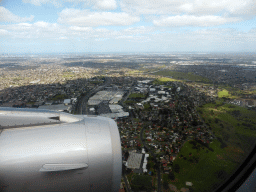 The suburb of Broadmeadows, skyscrapers in the city center and the coastline, viewed from the airplane from Sydney