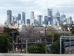 Skyscrapers in the city center and the railway, viewed from the taxi from the airport to the city center