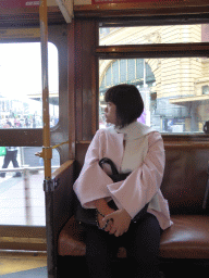 Miaomiao in the City Circle Tram, with a view on the front of the Flinders Street Railway Station at the crossing of Flinders Street and St. Kilda Road